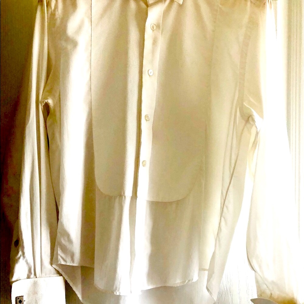 Tuxedo style shirt with cuff links included.
